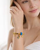 Dolphin charm, shell,and heart pendent bracelet